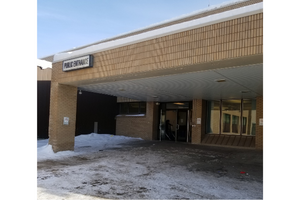 Outside entrance of Thompson hospital where people enter to go to clinic (c) CancerCare Manitoba